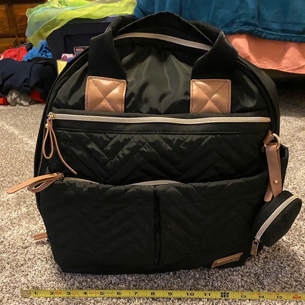 SkipHop Suite Up 6 in 1 backpack style diaper bag